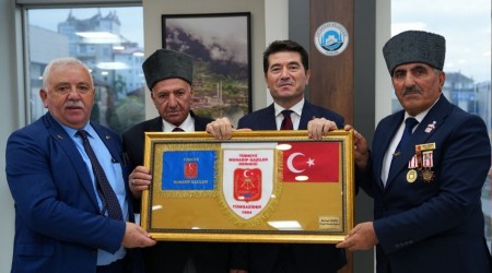 Bakan Kaya, Kbrs gazilerini ve ehit ailelerini arlad